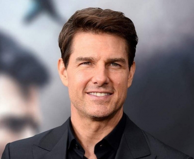 Tom Cruise invites King Charles III to be “my wingman any time”
